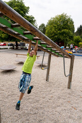 Fototapeta premium child playing on a swing