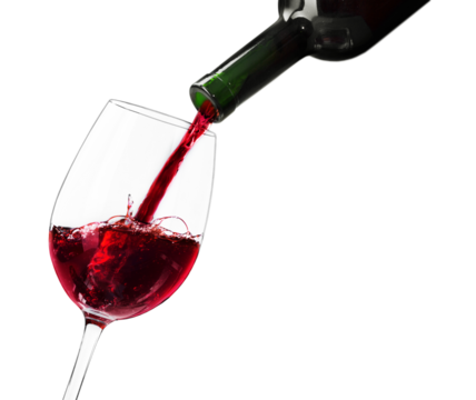 Pouring red wine in a glass on n background