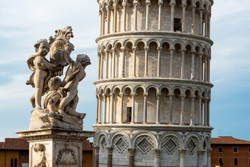 Marble statues in front of Pisa´ s leaning tower