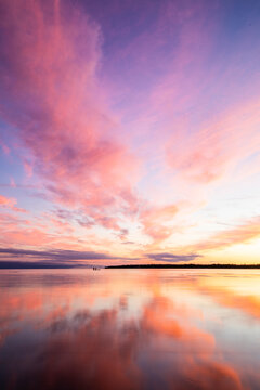 Colorful sunset and reflection at Bruce Peninsula National Park, Singing Sands Beach Tobermory