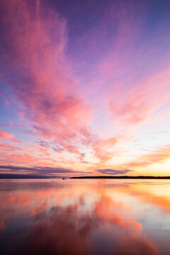 Colorful sunset and reflection at Bruce Peninsula National Park, Singing Sands Beach Tobermory