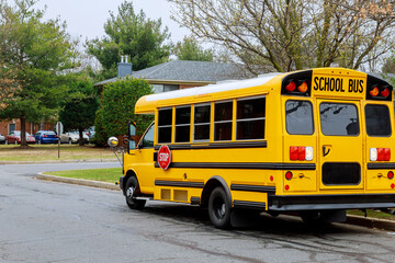 Traditional school buses on the road for transporting children to school.