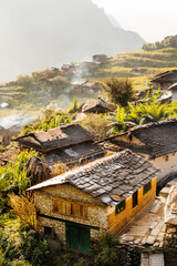 Nepali traditional houses in Muril village, in Himalaya mountains. Dhaulagiri circuit trek, Nepal.