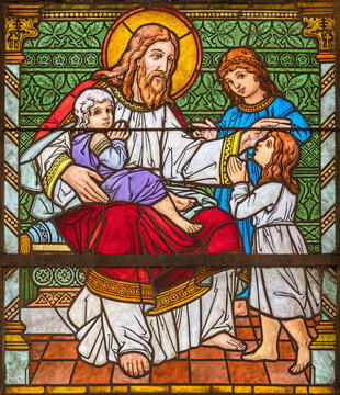 ZURICH, SWITZERLAND - JUNE 27, 2022: The Jesus among the children in St. Peter und Paul church by Albin Schweri (1885 - 1946).