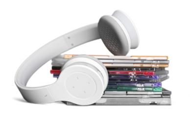 Headphones and compact discs  isolated   on background