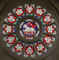 ZURICH, SWITZERLAND - JUNE 27, 2022: The Lamb of God in the rosette of St. Peter und Paul church...