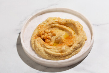 hummus on a marble plate