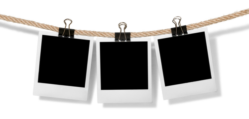 Hanging instant photo frames isolated on white