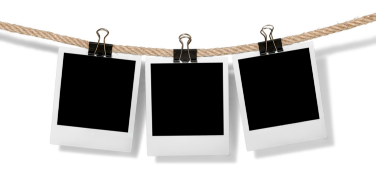 Hanging instant photo frames isolated on white