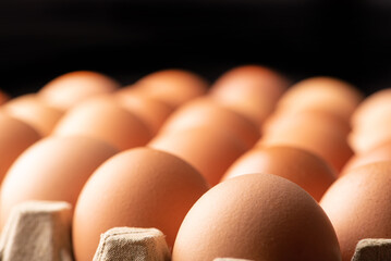Eggs, detail of red eggs in a row, selective focus.