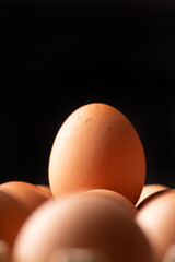 Eggs, detail of red eggs in a row, selective focus.
