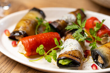 stuffed eggplant restaurant on white plate