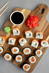 Homemade Sushi Platter with Wasabi and Soy Sauce on a Board, top view. Flat lay, overhead, from above.
