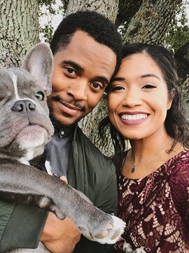 Selfie of a couple and their dog