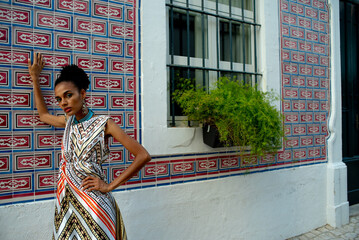 Confident street camera aware portrait of stunning influencer