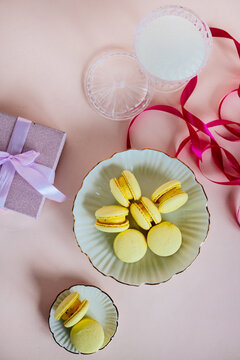 Pink Party Table Set With Yellow Macaron And Purple Present Box