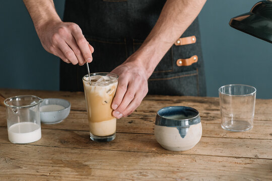 Barman Preparing Latte Macchiato