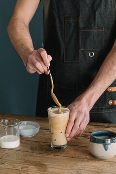 Barman Preparing Latte Macchiato