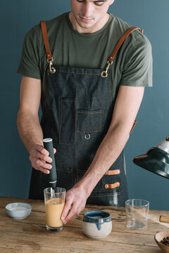 Barman Preparing Latte Macchiato