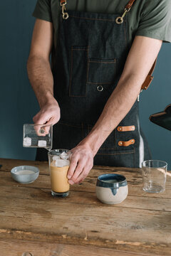 Barman Preparing Latte Macchiato