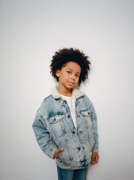 Young black kid posing in the studio