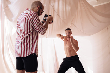 Photographer taking photo of choreographer 