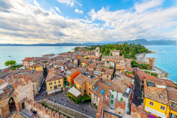 Fototapeta na wymiar View of the medieval old town and Lake Garda from the Scaligero Castle in the Italian resort town of Sirmione, Italy.