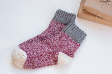 Warm knitted wool socks. A New Year's gift for a warm winter