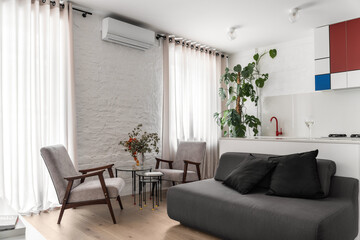 Loft living room stylish interior with grey sofa