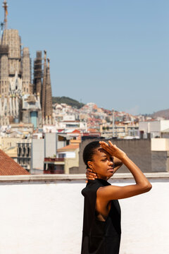 Black woman urban rooftop portrait