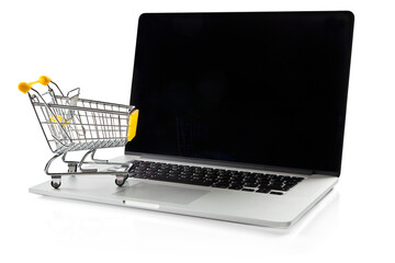 E-commerce. Shopping cart on laptop. Conceptual image.