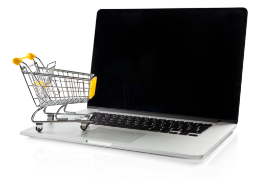 E-commerce. Shopping cart on laptop. Conceptual image.