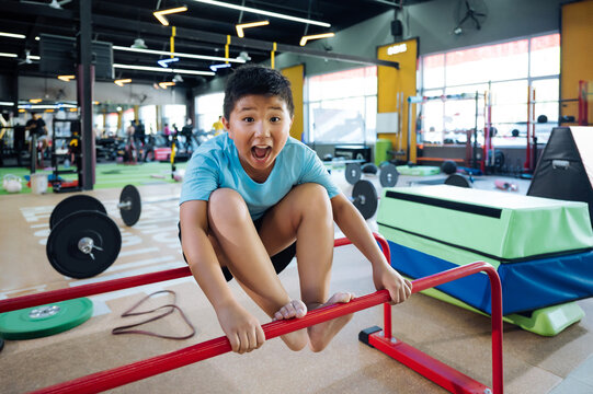 Happy kids training in gym