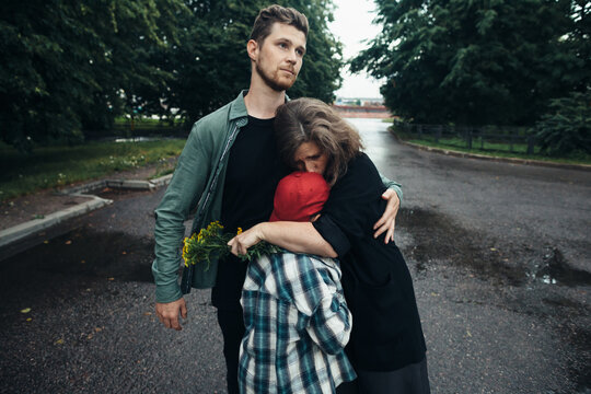 Parents comfort their child