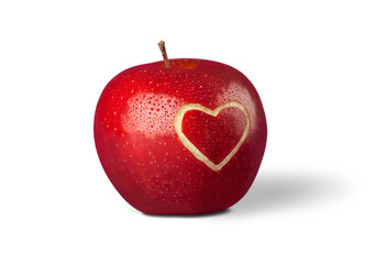 Red apple with a heart shaped cut-out on backgrouund