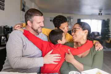 Family hug at Christmas time