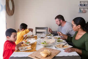 Family eating lunch together at home