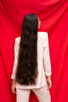 Minimalistic backside portrait of brunette female