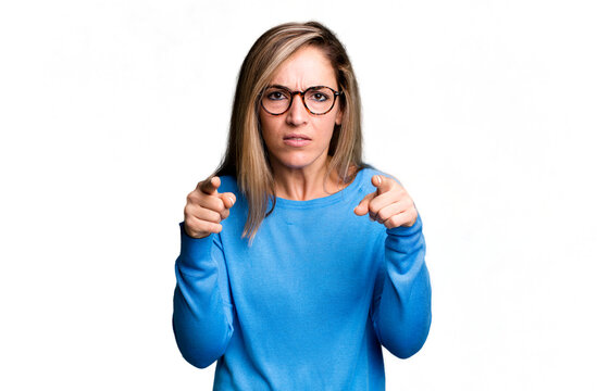 Blonde Adult Woman Pointing Forward At Camera With Both Fingers And Angry Expression, Telling You To Do Your Duty