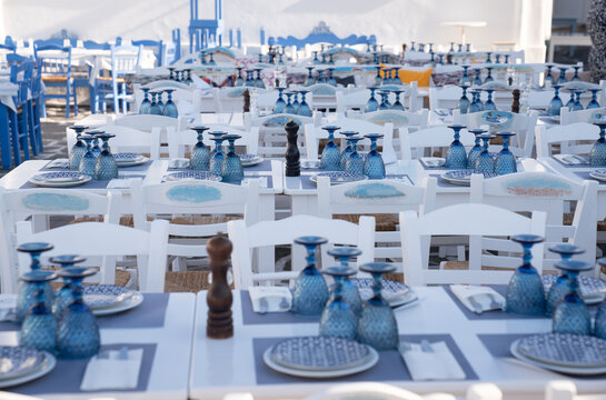 Set Tables At Restaurant Terrace In Greece