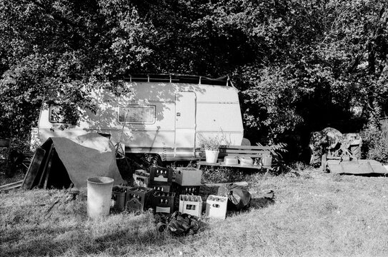 Caravan with Empty Beer Bottles in Front 