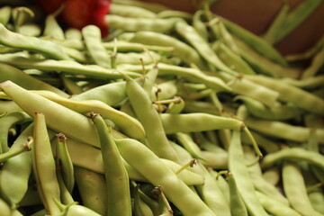 Colored fruits and vegetables at a grocery store. New season foods