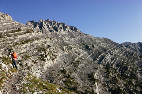 Anonymous Man With Red Backpack Climbing Mount Olympus in 1975