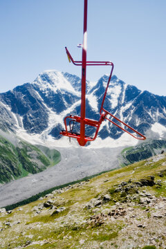 Red Single Mountain Chairlift Without Anyone