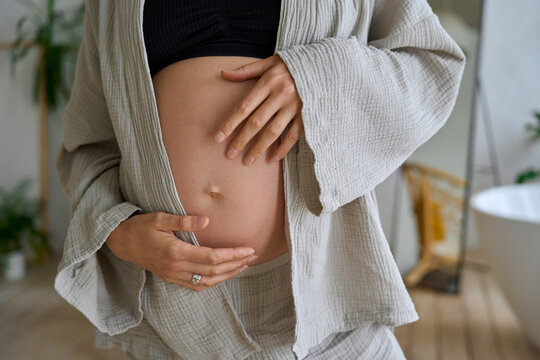 a pregnant woman takes care of her body