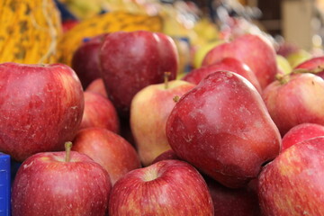 Colored fruits and vegetables at a grocery store. New season foods