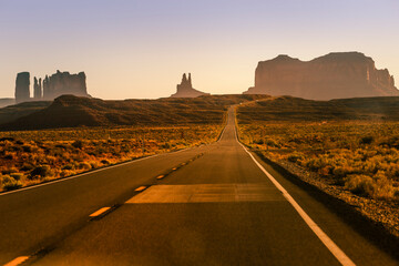 Highway Road U.S. Highway 163 and Monument Valley at sunset, Arizona, USA