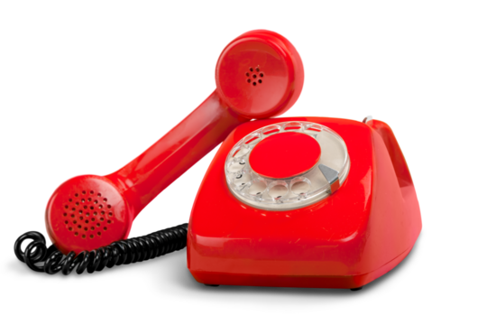 Retro red telephone on white background