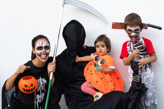 Funny family photo at halloween party