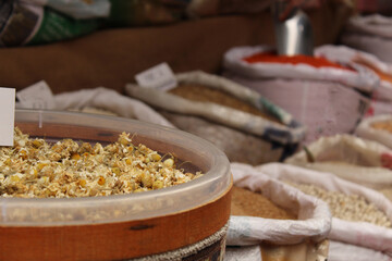 Dried winter tea ingredients in sacks at the store